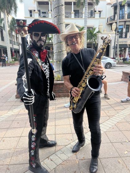 MattyB entertaining the audience with live sax at a Southwest Florida public show