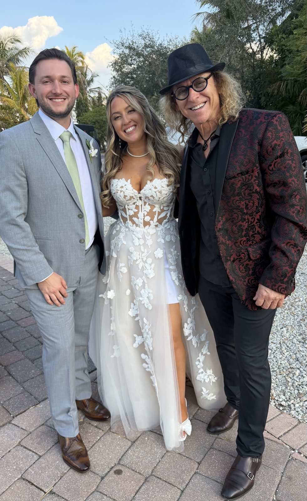 Matty B with the bride and groom at Grace River Island Resort